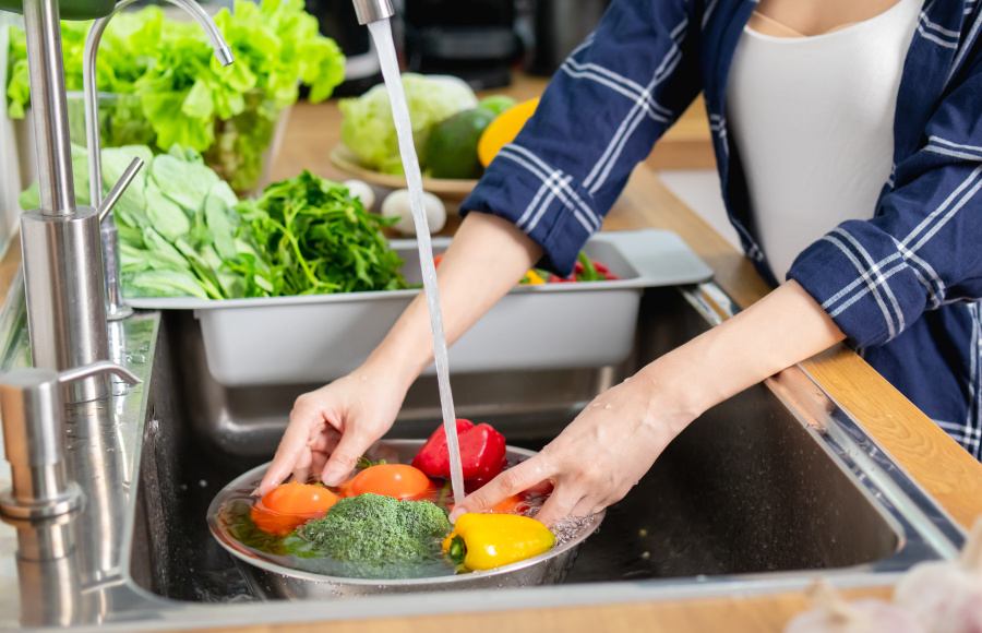 Woman washing vegtables