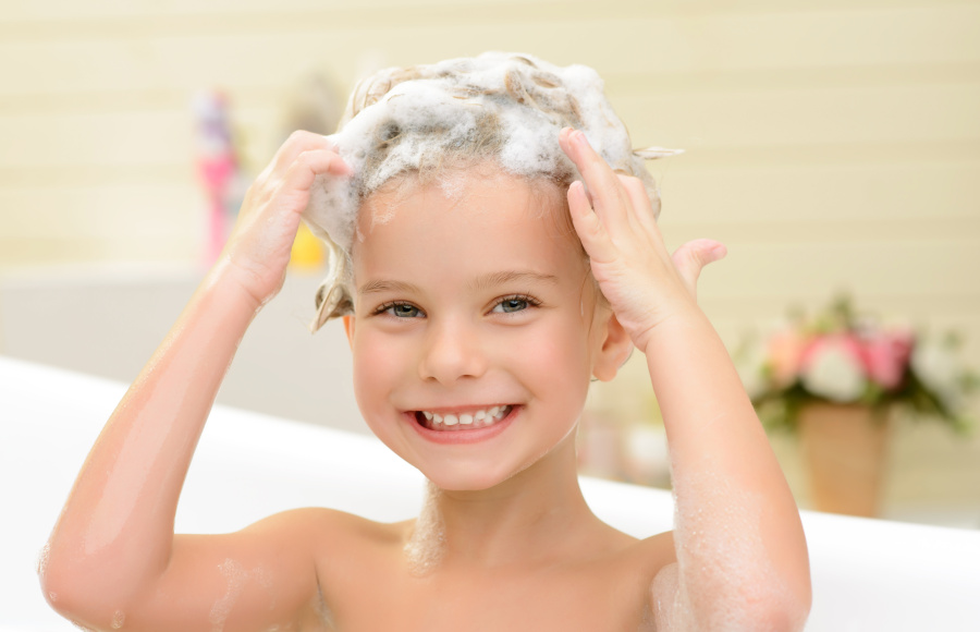 Kid washing hair